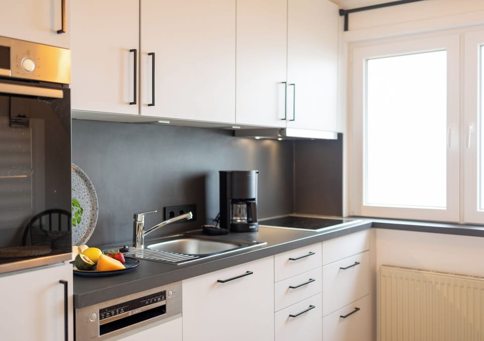 Apartment Wellengang Wittdün/Amrum   Kitchen units with oven, dishwasher, hob and coffee machine