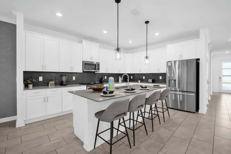 Spacious modern kitchen with sleek design, perfect for family gatherings and culinary adventures.