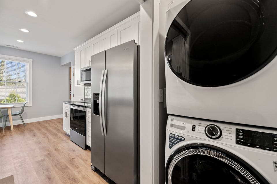 Washer/dryer and refrigerator with ice maker and filtered water. 