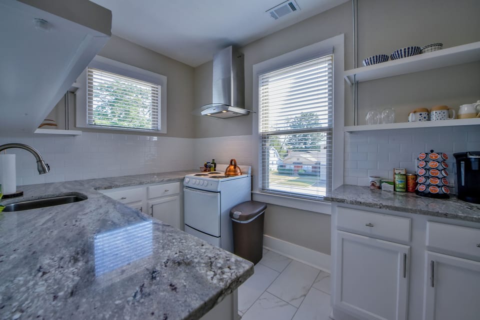 Kitchen - The kitchen has a coffee maker as well as a starter set of coffee supplies.
