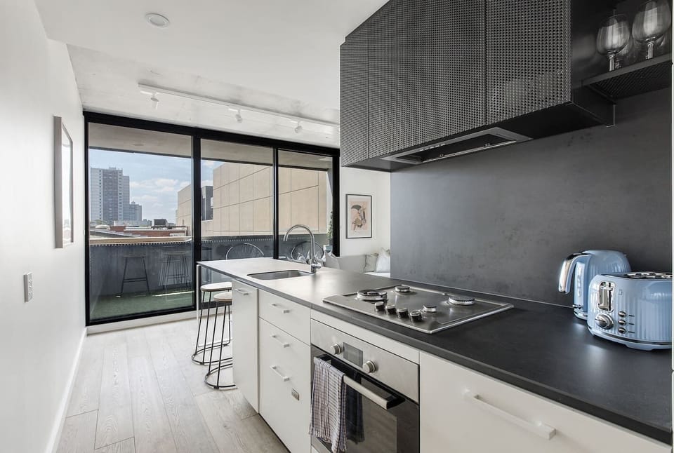 Create delicious meals with ease in the fully equipped kitchenette, complete with an oven, dishwasher, and Nespresso machine.