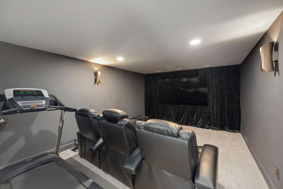 Theatre room with 70" TV and surround sound