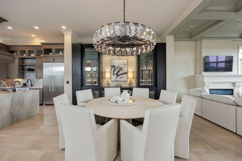 Dining area with seating for 8. Custom climate controlled wine storage