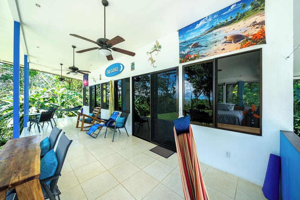 Comfortable  balcony, desk, tables, rocking chair,hammock,yoga mats, ocean view