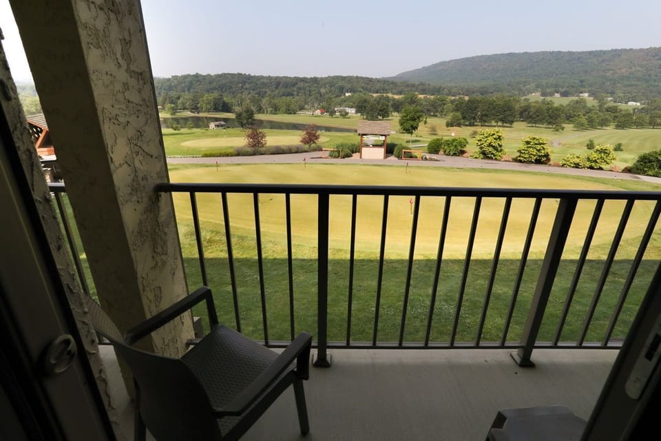 Enjoy breathtaking views of rolling hills and open fields from your private balcony.