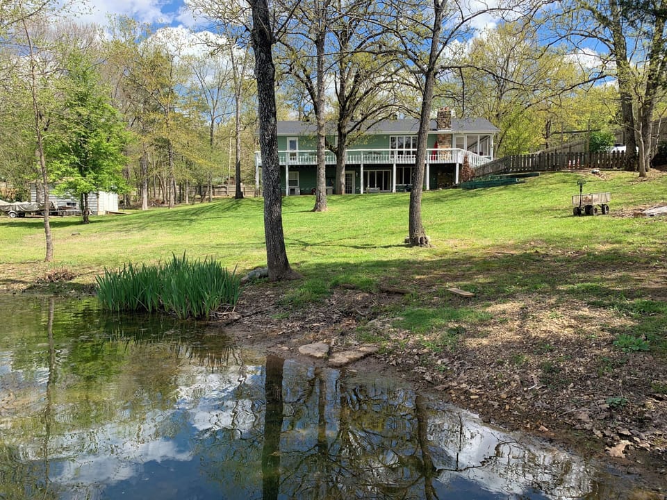 Enjoy the Lakehouse Lilypad with this large yard right on the lake!