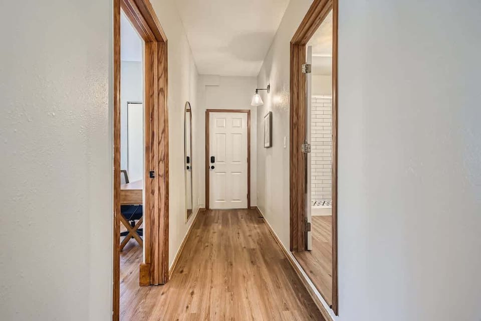 This doorway provides direct access to the shared laundry with the basement unit