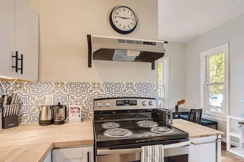 Brand new stainless steel appliances and light wood are our modern finishing touches 