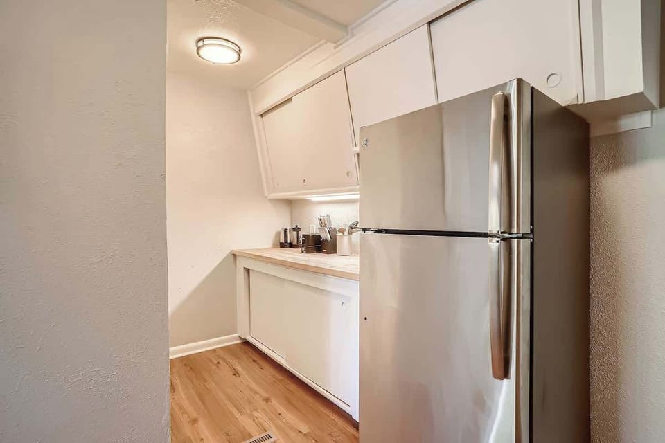 Galley area of kitchen offers plenty of countertop space to make the most of your cooking