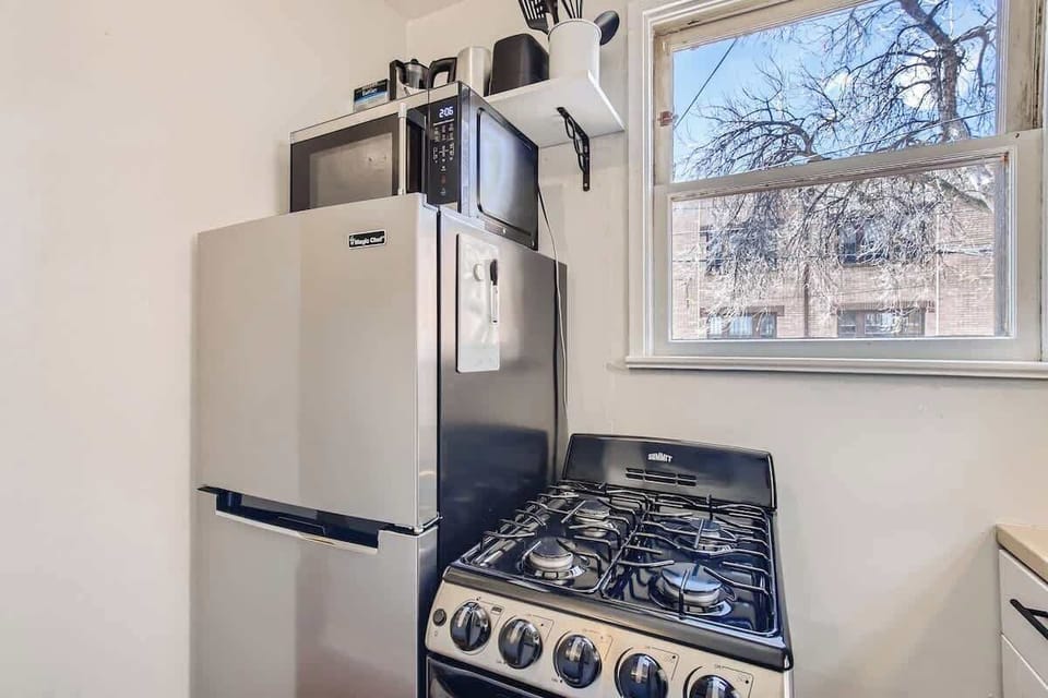The kitchen comes equipped with all the cooking essentials you'd need to prepare meals at home