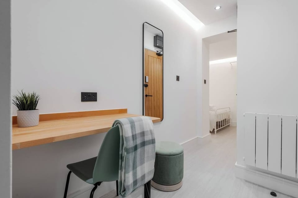 A convenient desk area provides a comfortable space for working or studying during your stay.
