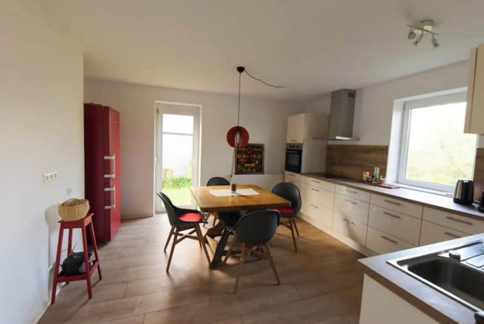 Large modern kitchen with dinning area
