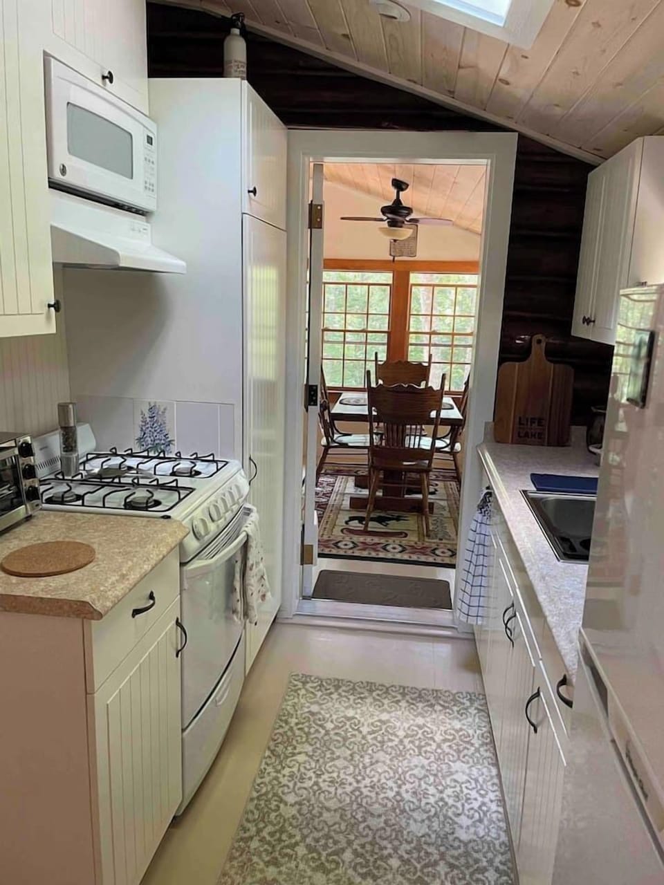 Fully equipped kitchen for cooking and serving in the dining area. 