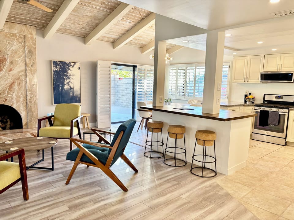 Kitchen is open to the dining room (which seats 8) and to the living room.