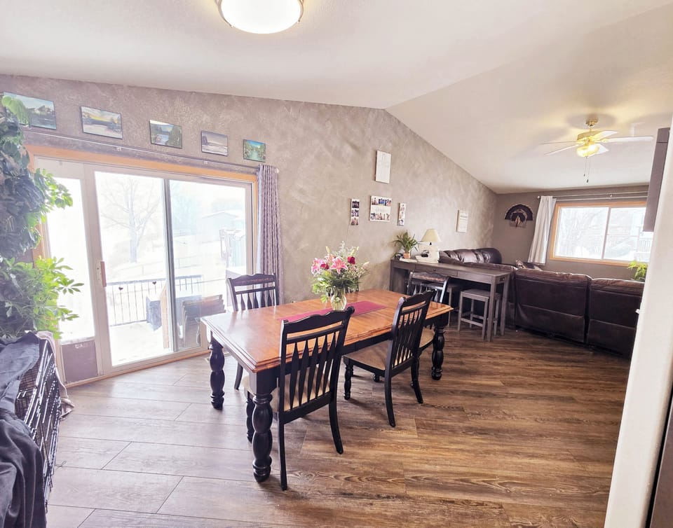 Dining room table + Table behind Couch seats 3, + Extra chair!