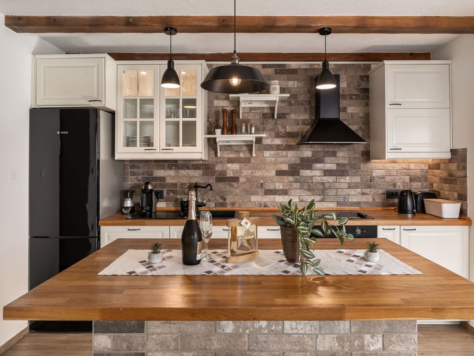 Furniture, Kitchen, Countertop, Interior Design, Flooring, Cabinetry, Wall, Light Fixture, Wood, Floor