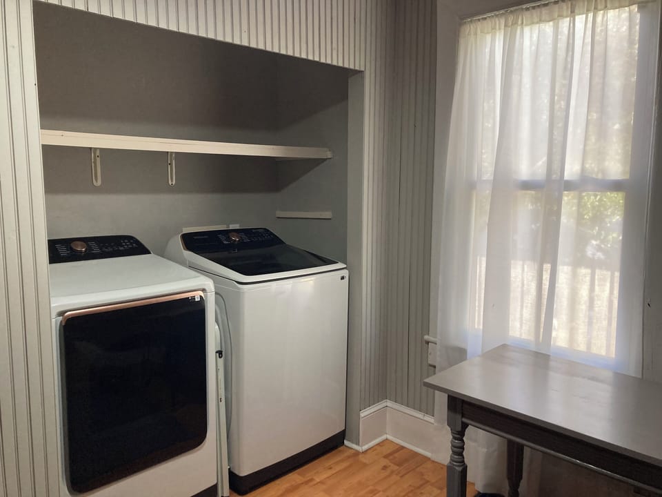 First floor laundry room off of kitchen.