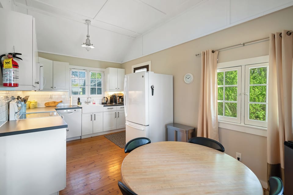 Kitchen and small four-person dining table