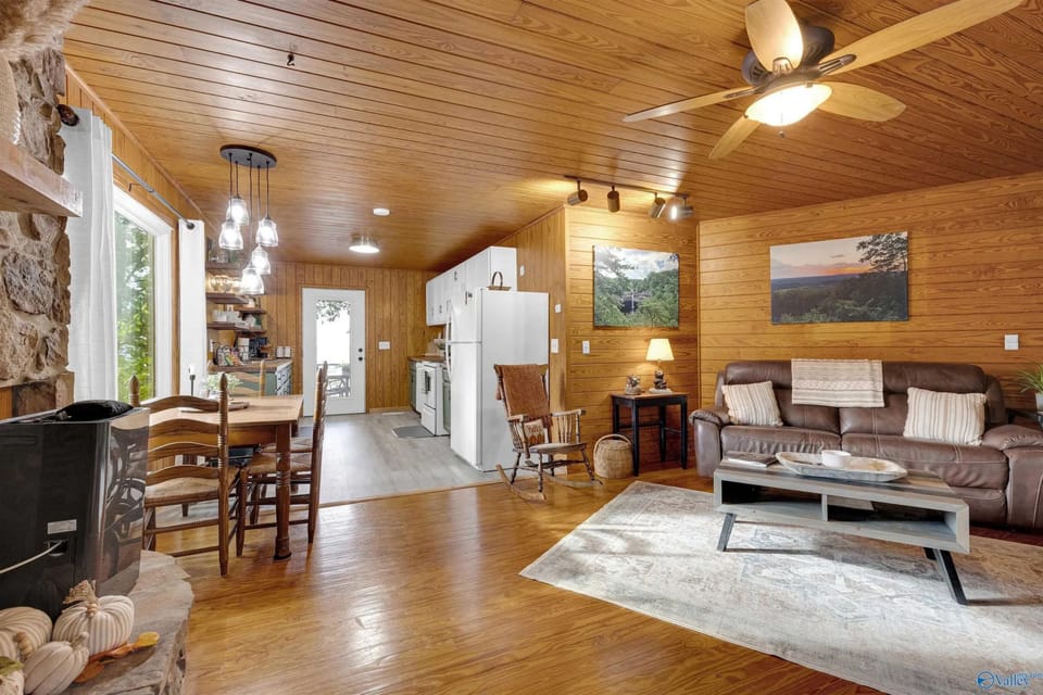Full kitchen and greatroom including dining area.