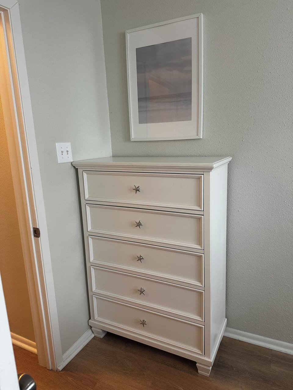 5 drawer dresser in the primary bedroom