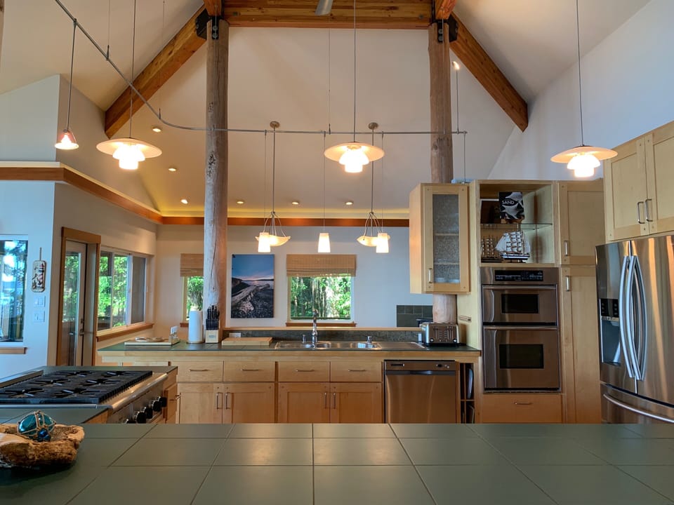 Enjoy cooking in the huge oceanfront  kitchen with a 6-burner Thermador cooktop