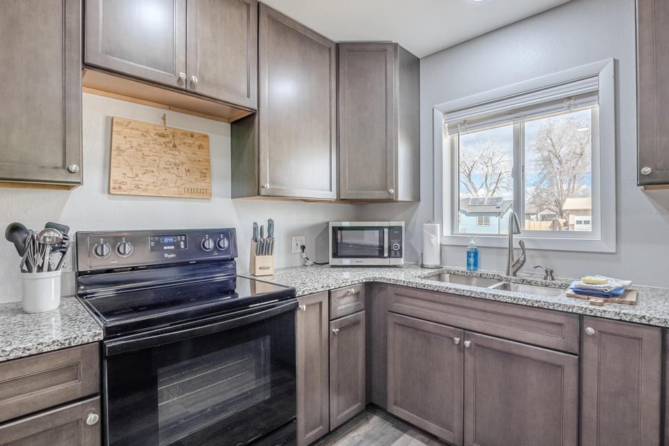 Elevate your cooking experience in this gourmet-inspired kitchen.