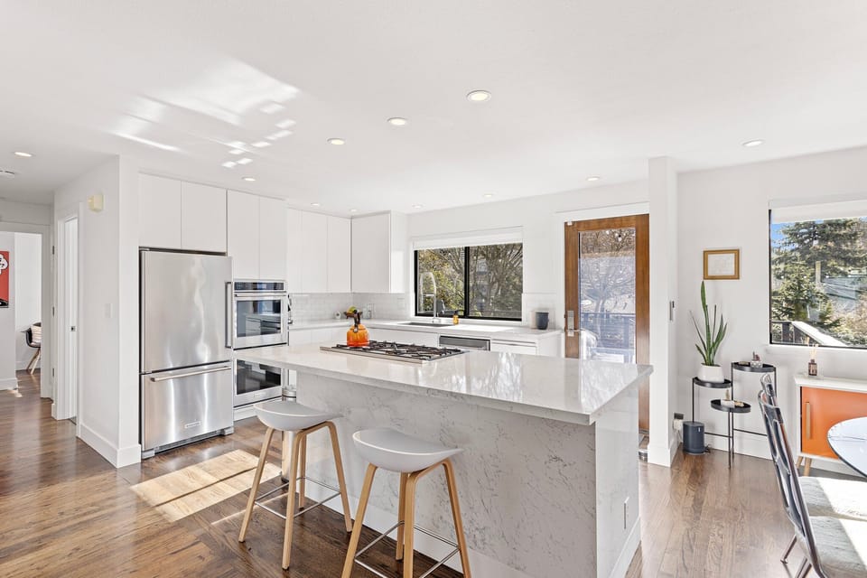 Gourmet kitchen with 5 burner gas Bertazoni stove top, Kitchen Aid appliances, double oven, Berkey water filter system, & Breville Espresso maker
