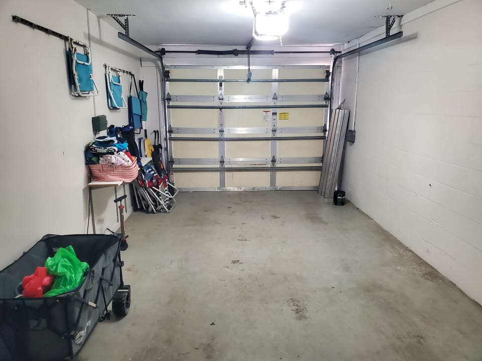 Clean and spacious garage with ample storage space for equipment.