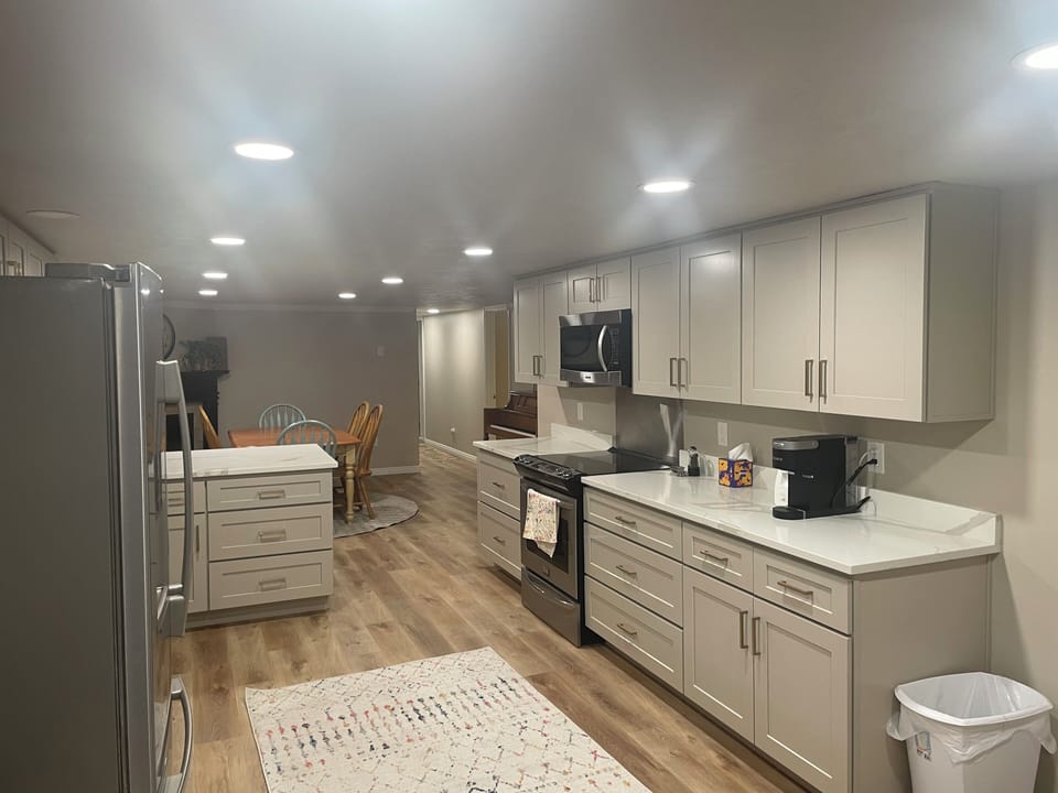 New kitchen cabinets, counters, sink and newer appliances