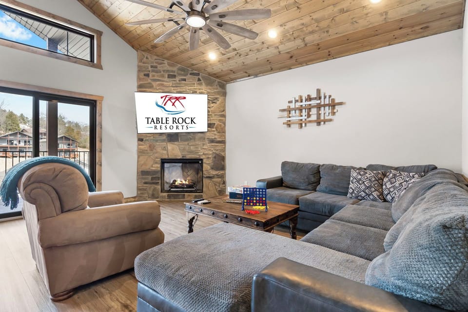 Living Room with Plush Seating, Cable TV, Family Games, Fireplace, Deck Access