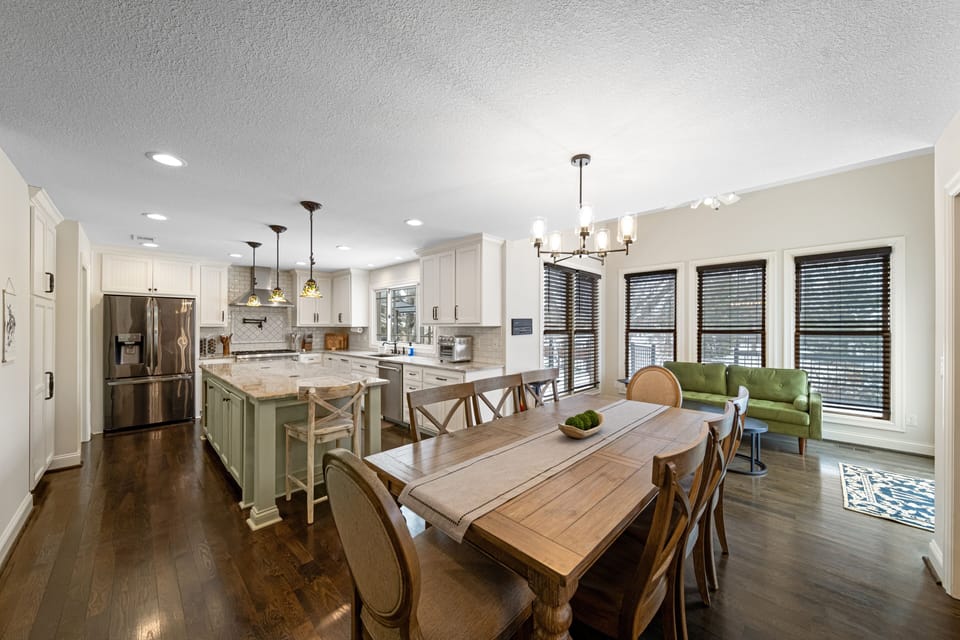 Indulge in delicious meals at this large bonus dining table