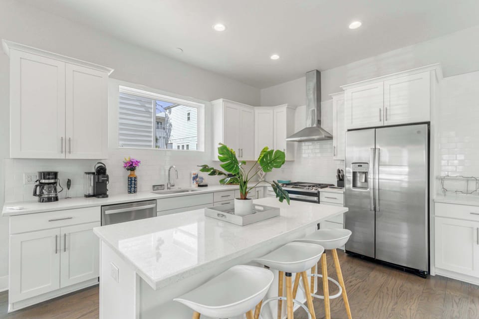 Kitchen: Main floor,drip coffee maker, keurig, crockpot, toaster, cooking utensils, tableware