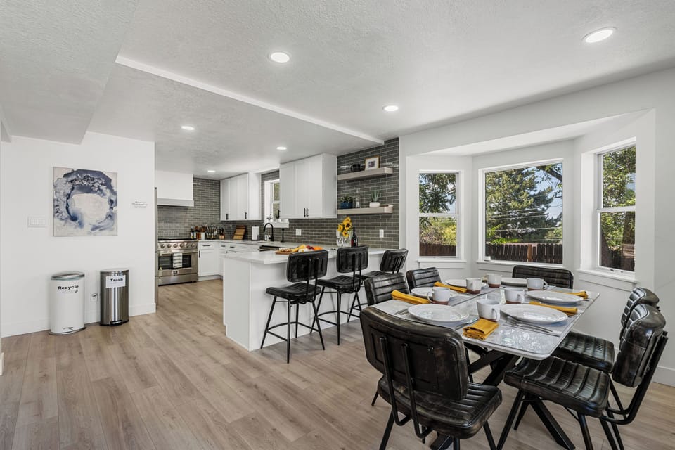 Open kitchen connected to dining area and living room