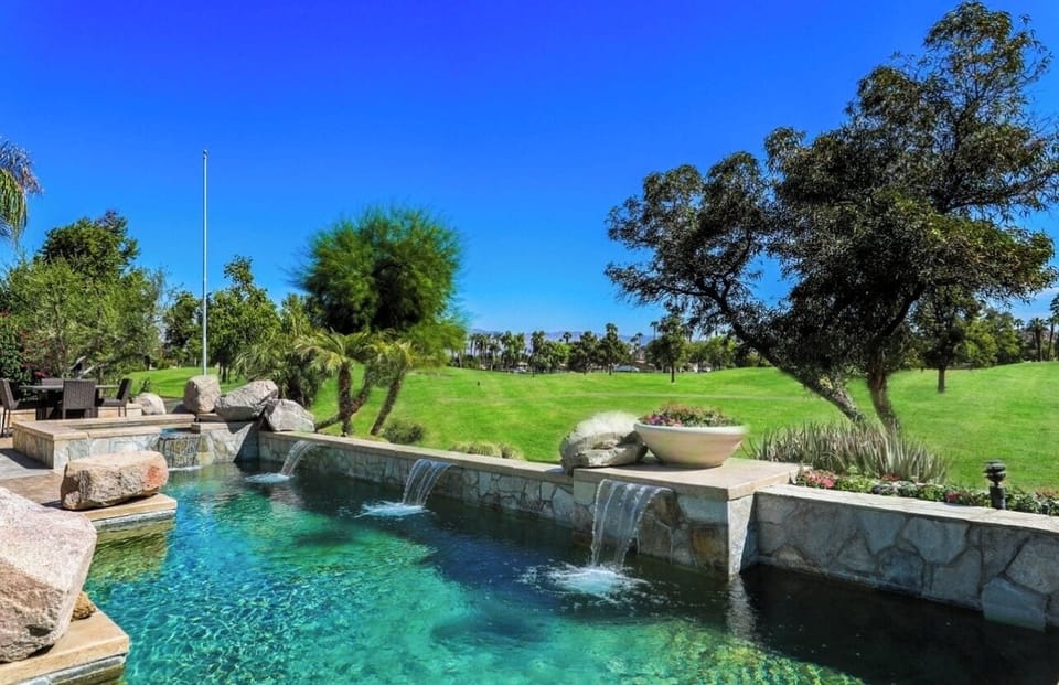 Backyard with saltwater pool and jacuzzi