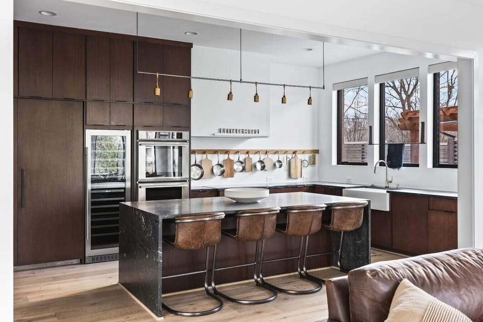 Fully-stocked, modern kitchen suitable for any chef! Seating for 4 at the kitchen island.