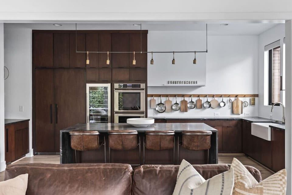 Fully-stocked, modern kitchen suitable for any chef! Seating for 4 at the kitchen island.