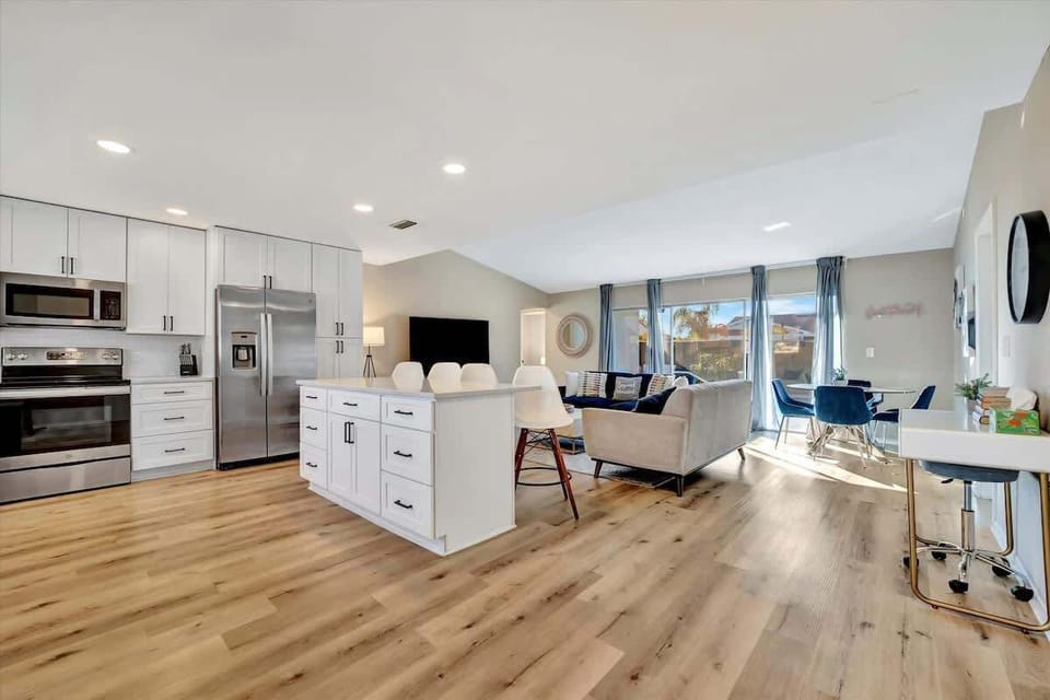 Open concept, open possibilities! From gourmet meals to movie nights, this space is designed for unforgettable memories with your favorite people