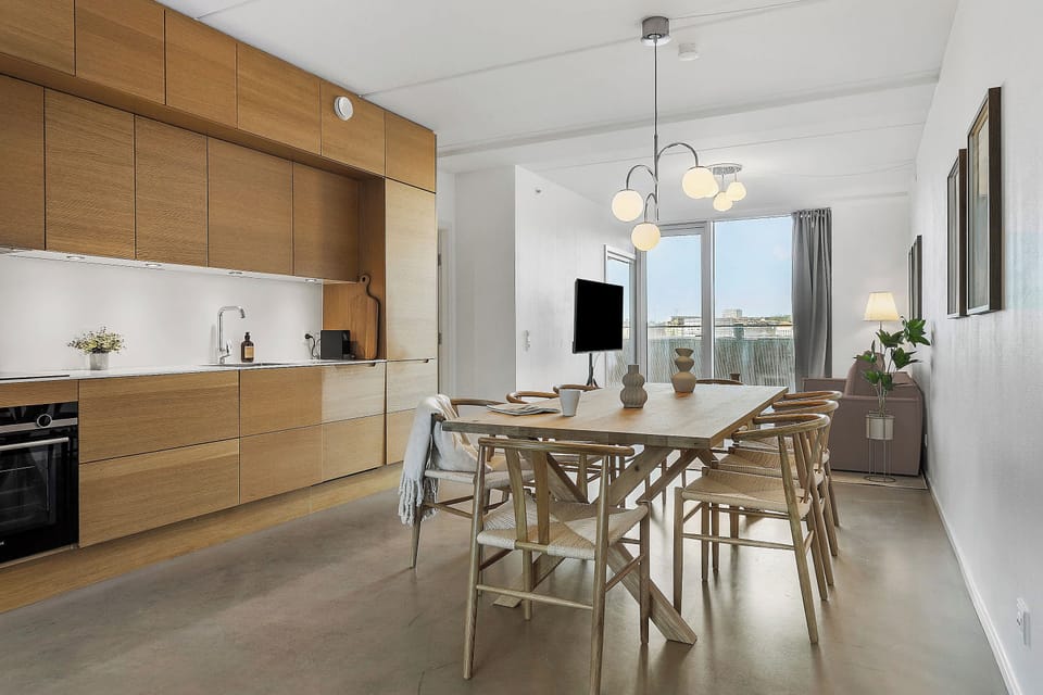 Dining area with 8 comfortable seats in the beautiful and very bright room with lots of sunlights access to both of the private balconies from this room.
