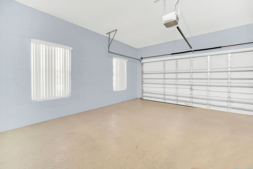 Private Garage with Ample Driveway Space