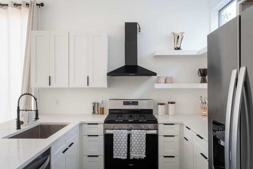 Fully equipped kitchen with stainless steel appliances
