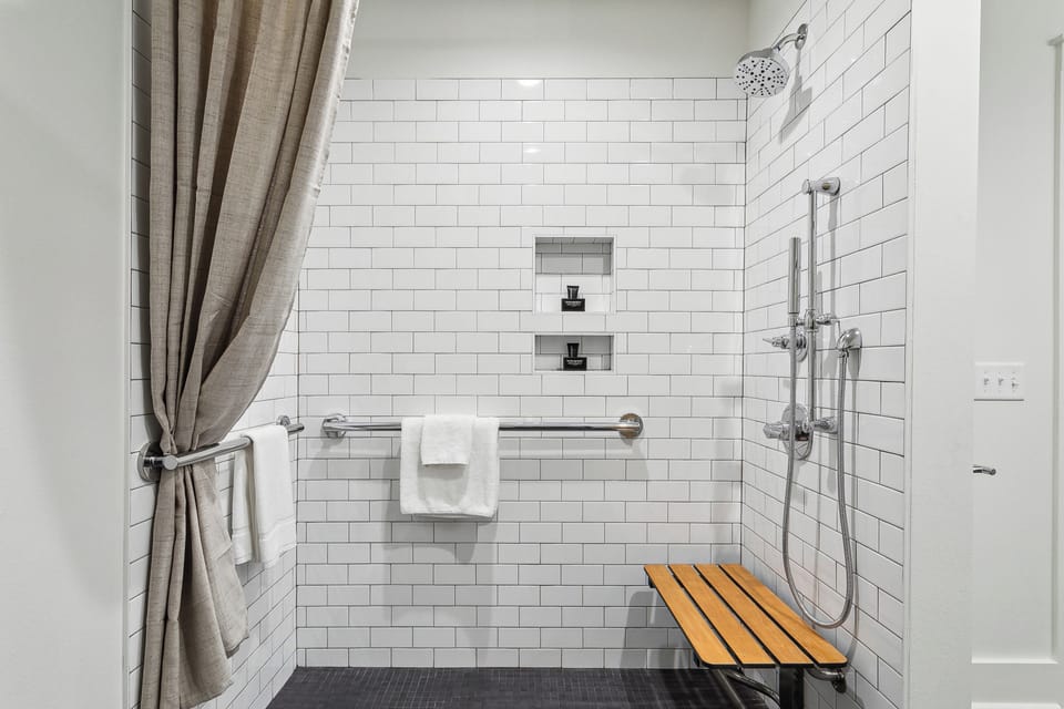 ADA Compliant Bathroom, walk in shower and grab bars