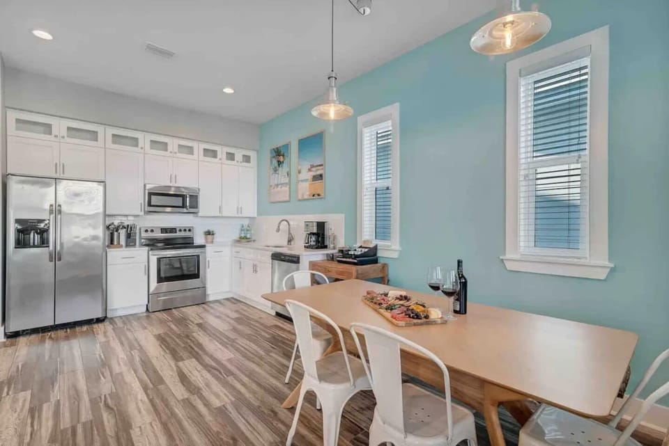 Dining area that easily sits up to six guests and set adjacent to the kitchen for easy access