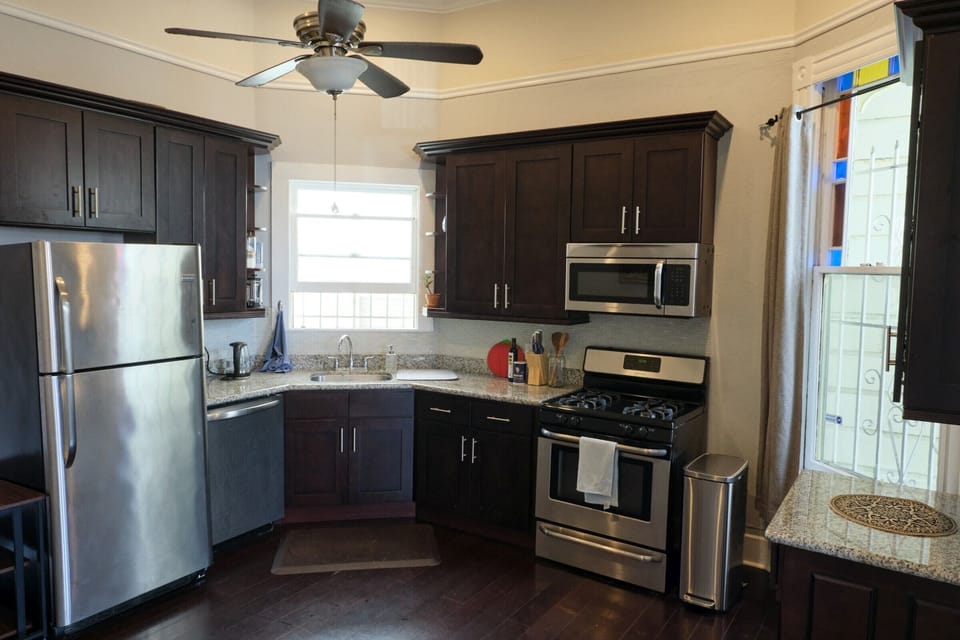 Full kitchen with all kitchen basics including pots/pans, utensils, and spices