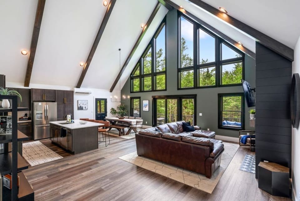 From the leather couches to the statement fireplace, every detail in this room is perfect.