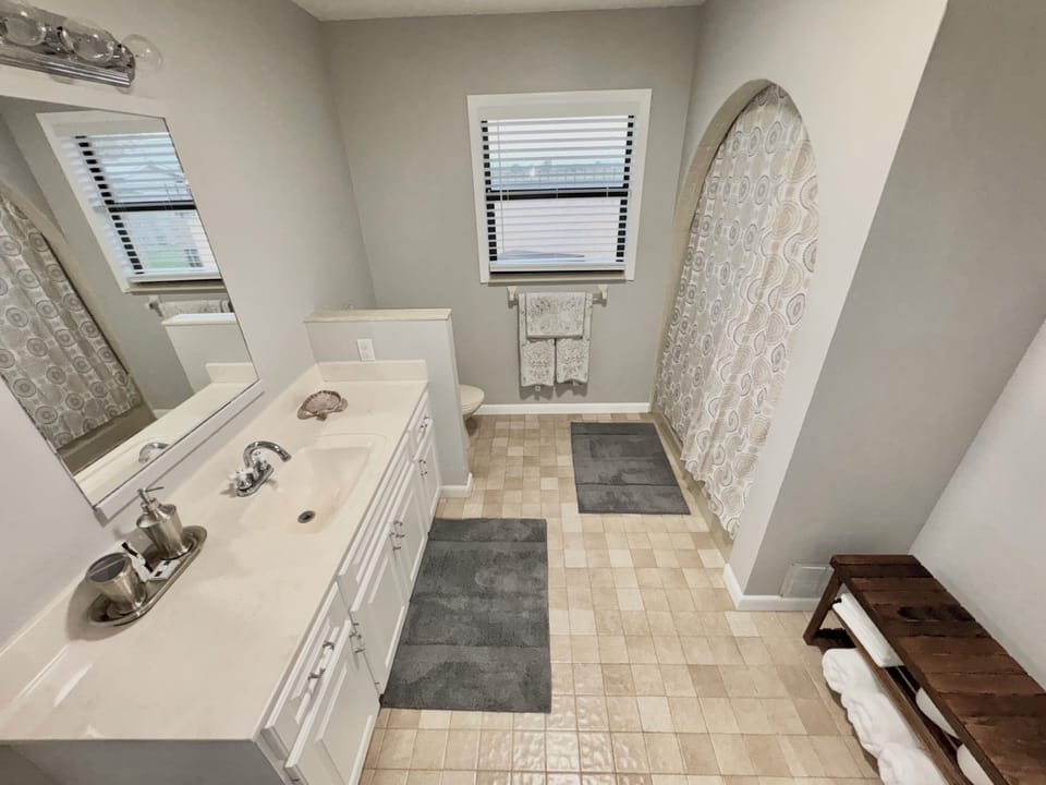 Refresh in our bright and airy second bathroom.