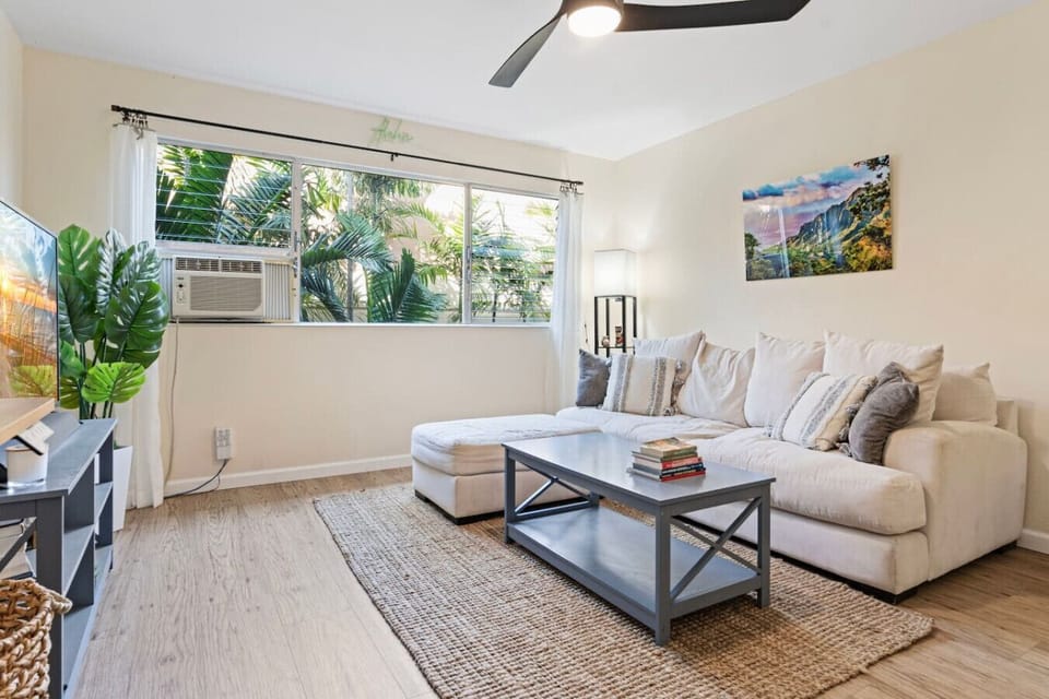 Step into a living room that blends laid-back charm with modern touches.