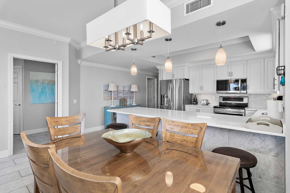 Family-style dining made easy with large table and breakfast bar