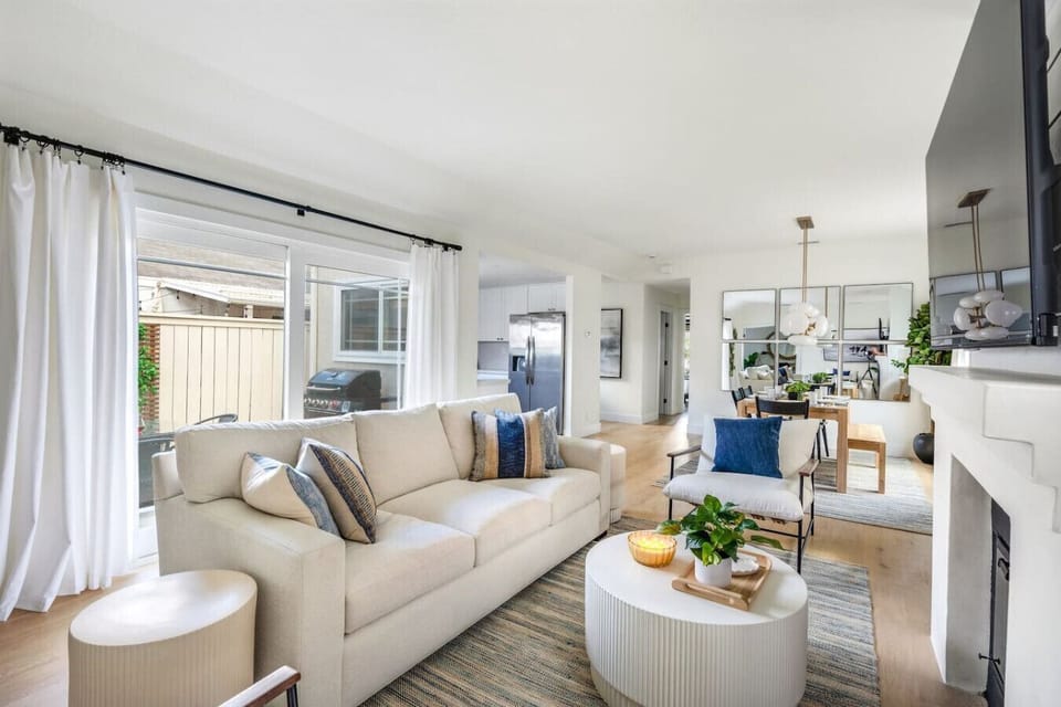 Open concept living space, No air conditioning - feel free to open windows and fans and enjoy the coastal breeze!