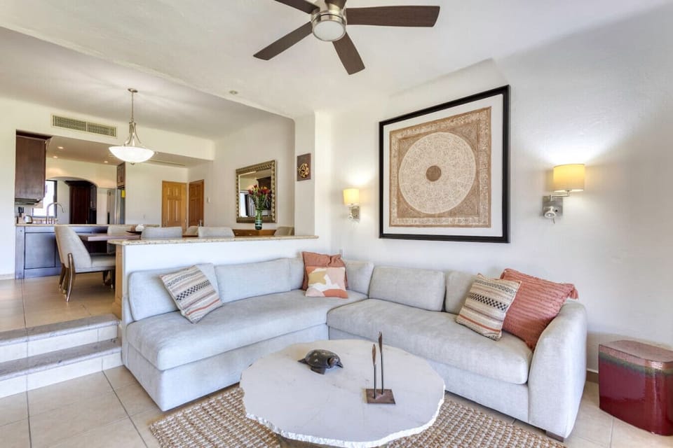 Cozy living room with sectional sofa and modern décor.
