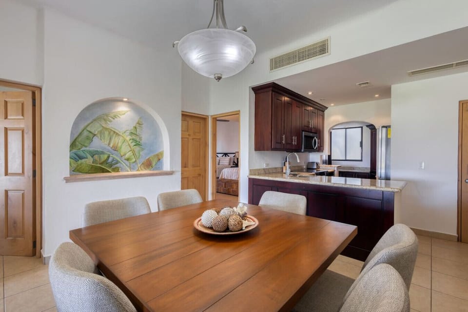 Open dining area with view into the kitchen.
